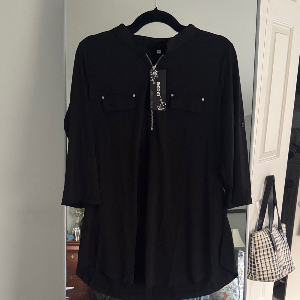 Elegant Black Women's Blouse by [Brand]